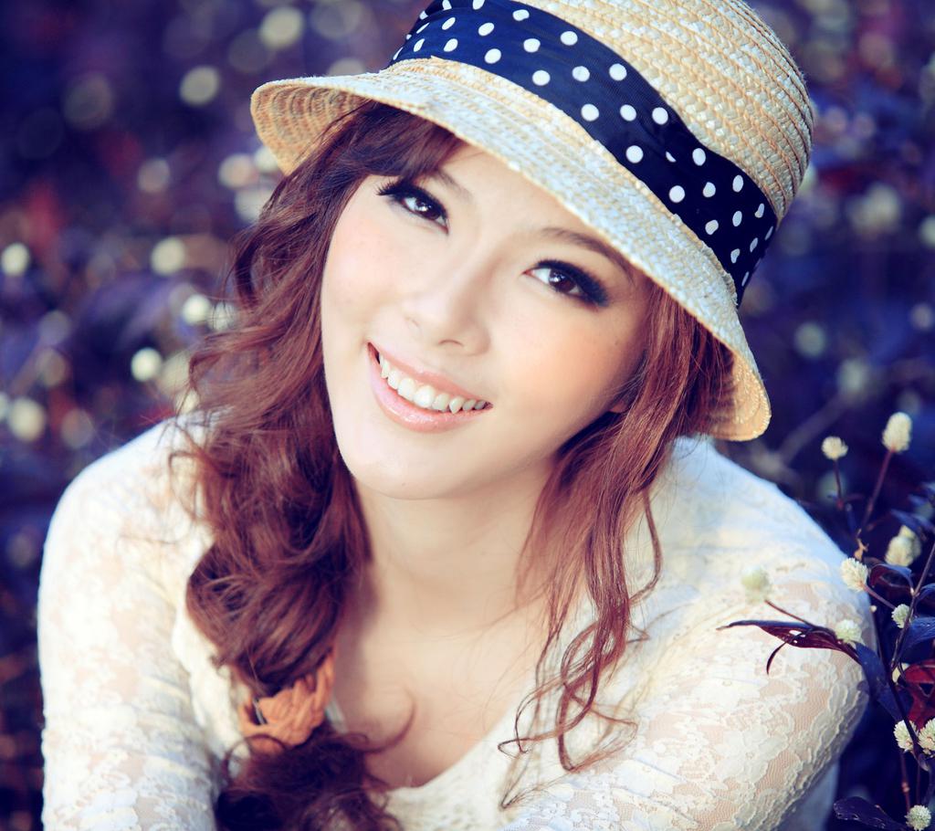 戴帽子的美女图片