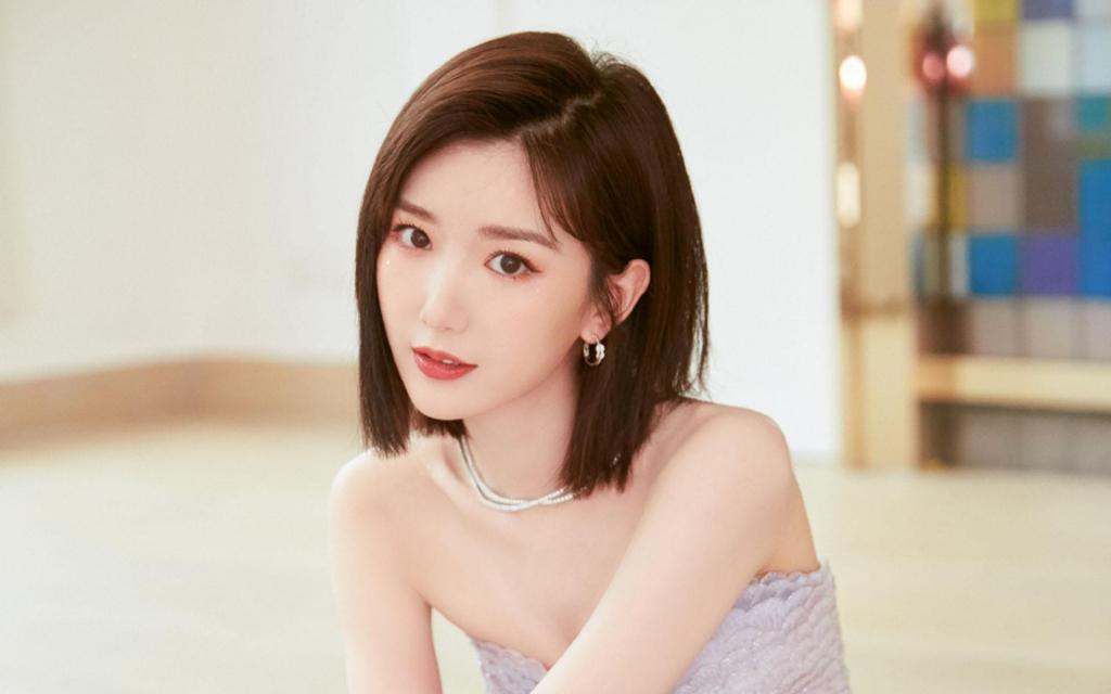 毛晓彤紫色长裙优雅知性白嫩迷人写真